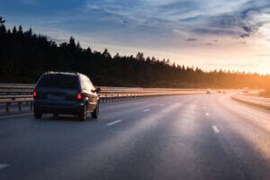 Car on the highway sunrise