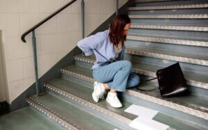 Woman Slipping Down the Stairs
